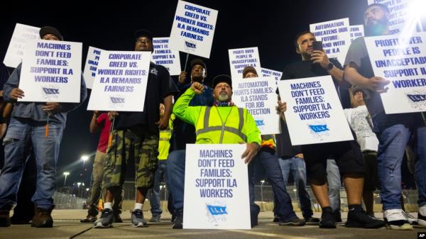 Longshoremen strike at midnight at Bayport Terminal on Oct. 1, 2024, in Houston. 