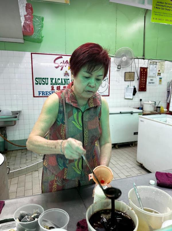 72-year-old Jenny Hong said she is happy to continue working as the business helps support her and her family's finances.