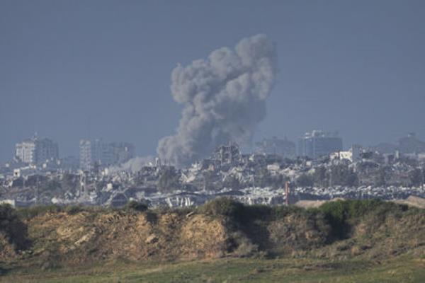 Smoke rises following an Israeli bombardment in the Gaza Strip, as seen from southern Israel, Sunday, Dec. 24, 2023. 