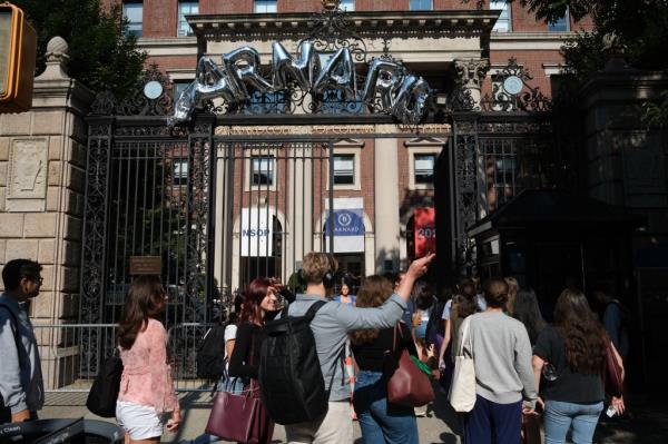 Students line up to enter Barnard College of Columbia University on the second day of classes during the fall semester on Wednesday, September 4, 2024.