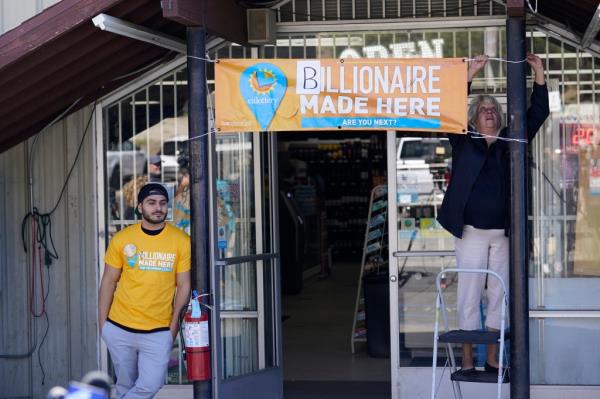 The beloved shopkeeper and Syrian immigrant said he plans to save a chunk of the store's $1 million payout from the winnings for his children's college education fund. 