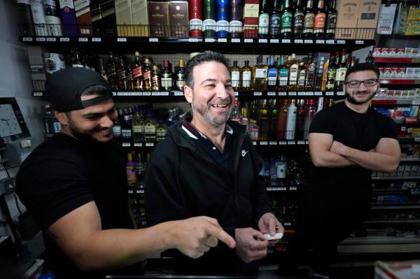 Locals who stopped into Midway Market & Liquor Store Thursday walked in and shook Khalil's hand, congratulating him on the win. 