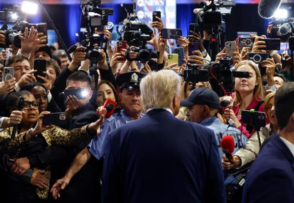 US Vice President and Democratic presidential candidate Kamala Harris and US Second Gentleman Douglas Emhoff attend a watch party after a presidential debate with former US President and Republican presidential candidate Donald Trump.